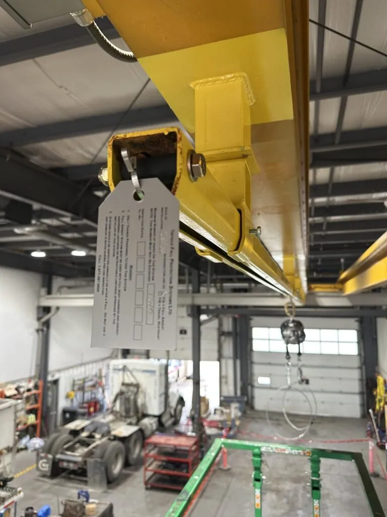 The system identification tag fitted at the end of the rigid rail.
